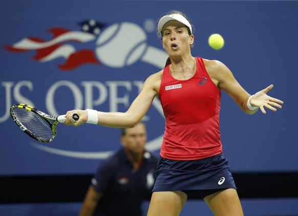 Johanna Konta, of Britain, returns the ball during the first set of her fourth round match against Petra Kvitova, of Czech Republic, at the U.S. Open tennis tournament in New York, Monday, Sept. 7, 20 ...