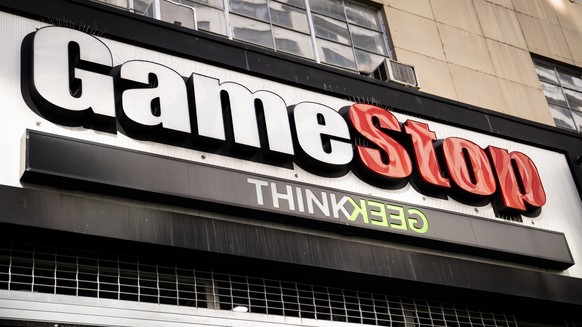 FILE - Pedestrians pass a GameStop store on 14th Street at Union Square, Thursday, Jan. 28, 2021, in the Manhattan borough of New York. Followers of YouTube personality Roaring Kitty, inspired by his  ...