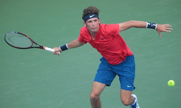 epa06146473 Jared Donaldson of the US in action against Roberto Bautista Agut of Spain during the first round of the Western and Southern Open at the Lindner Family Tennis Center in Mason Ohio, USA 15 ...