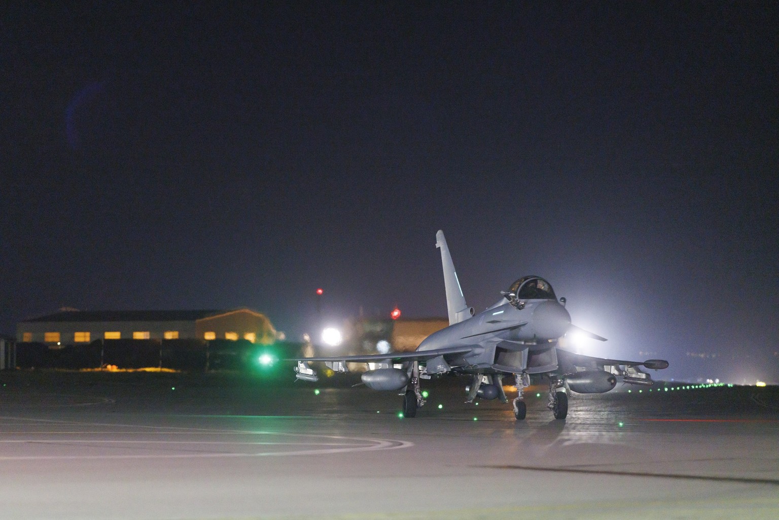 epa11125766 A handout photo made available by the British Ministry of Defence (MOD) shows an RAF Typhoon FGR4 aircraft after returning to the base following strikes against Houthi targets in Yemen, at ...
