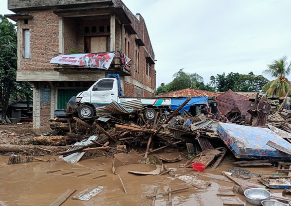 epa09116325 A handout photo made available by East Adonara Police station shows a general view of the aftermath of a flash flood in Adonara, East Flores, Indonesia, 04 April 2021 (issued 05 April 2021 ...