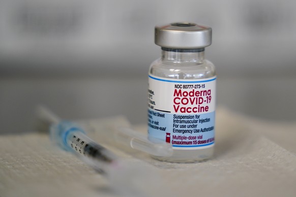 FILE -  A vial of the Moderna COVID-19 vaccine is seen during a vaccination clinic at the Norristown Public Health Center in Norristown, Pa., Tuesday, Dec. 7, 2021. Moderna said Monday, Dec. 20, 2021 that a booster dose of its COVID-19 vaccine should offer protection against the rapidly spreading omicron variant. (AP Photo/Matt Rourke, File)