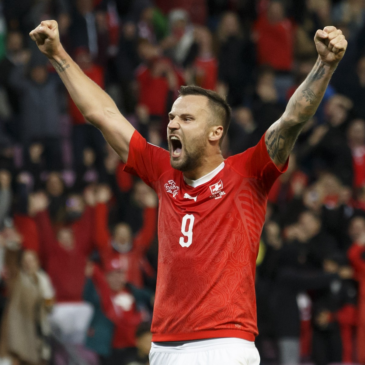 Switzerland's forward Haris Seferovic, right, celebrates the goal from his teammate past Ireland's defender Enda Stevens, left, and Ireland's goalkeeper Darren Randolph, during the UEFA ...