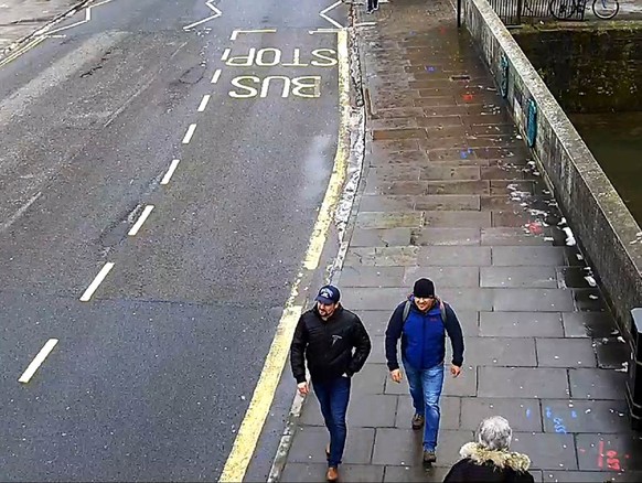 epa06998335 A handout photo made available by the British London Metropolitan Police (MPS) showing both suspects Alexander Petrov (R) and Ruslan Boshirov (L) on Fisherton Road, Salisbury at 13:05hrs ( ...