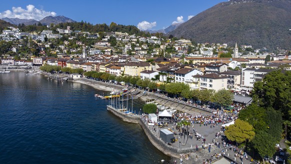 View over the Chestnut Festival in Ascona, Lake Maggiore, Ticino, Switzerland, 13 October 2018. 2000 kg of chestnuts are roasted on seven fires. (KEYSTONE/Ti-Press/ Pablo Gianinazzi)