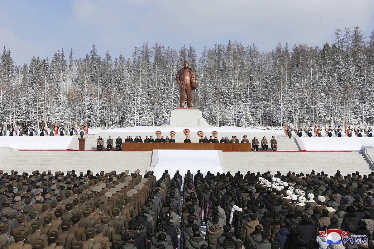 In this photo provided by the North Korean government, a meeting is held to celebrate the 80th birth anniversary of North Korea's late leader Kim Jong Il in Samjiyon City, North Korea Tuesday, Fe ...