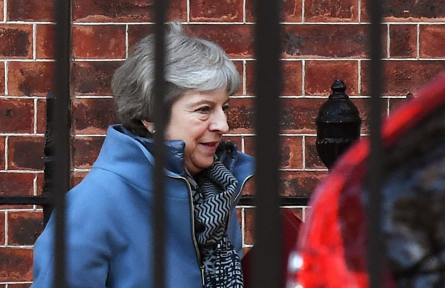 epa07269292 British Prime Minister Theresa May departs Downing Street for Parliament in London, Britain, 08 January 2019. Members of British Parliament will vote on the Brexit deal on 14 January 2019. ...