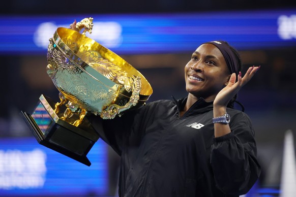 epaselect epa11645417 Coco Gauff of USA poses with the trophy after winning her Women&#039;s Singles Final match against Karolina Muchova of Czech Republic in the China Open tennis tournament in Beiji ...