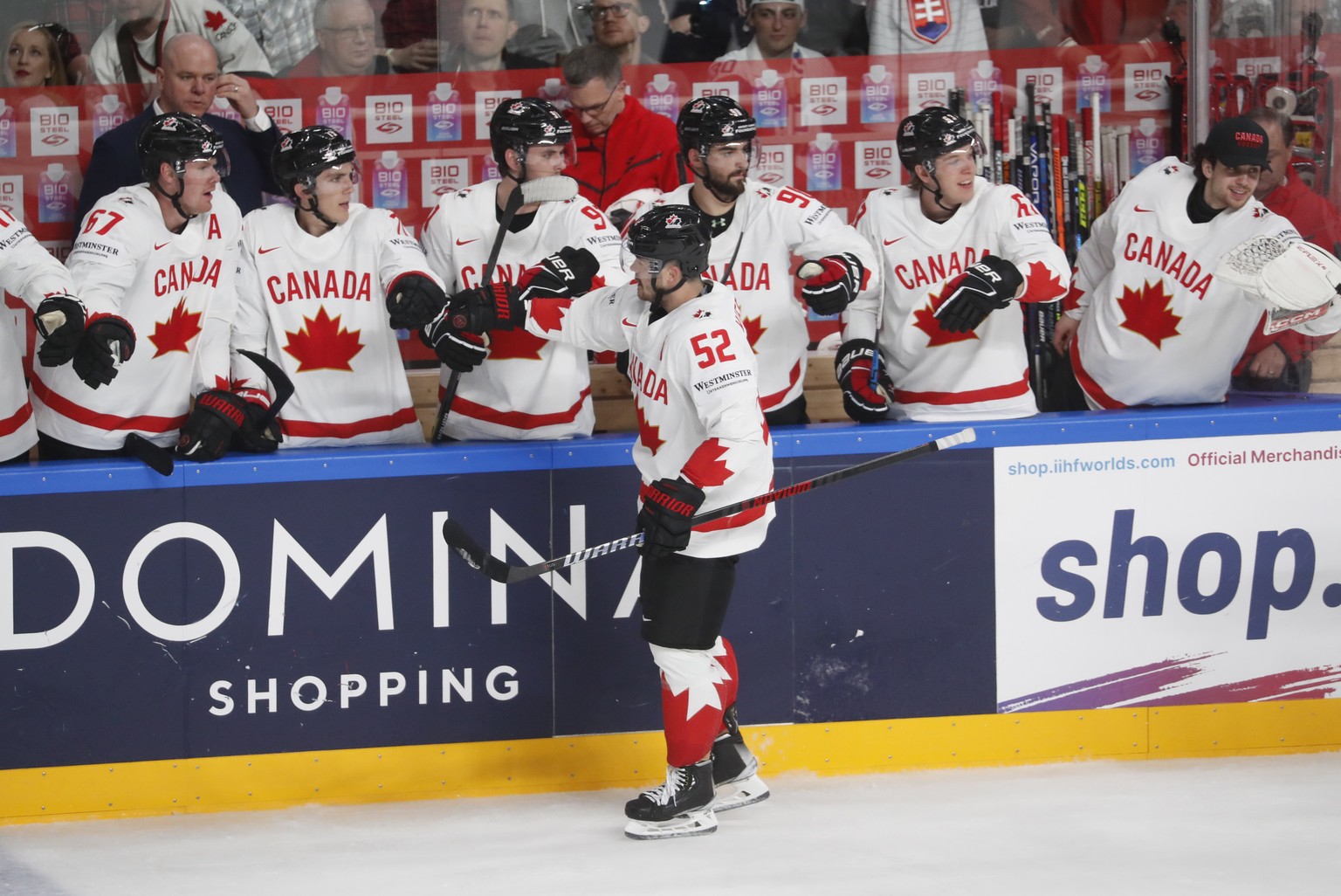 epa10623514 Mackenzie Weeger of Canada celebrates with his teammates after scoring during the preliminary round group B match between Latvia and Canada at the IIHF Ice Hockey World Championship 2023 i ...