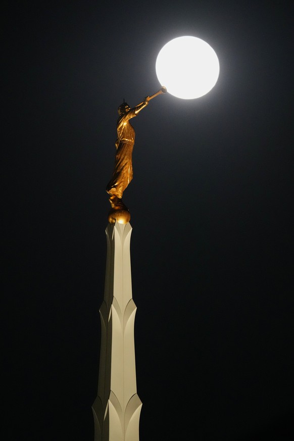 A statue of the Angel Moroni atop the Dallas Texas Temple is visible with the full &quot;beaver&quot; supermoon above it Wednesday, Nov. 5, 2025, in Dallas. (AP Photo/Julio Cortez)
Texas Supermoon