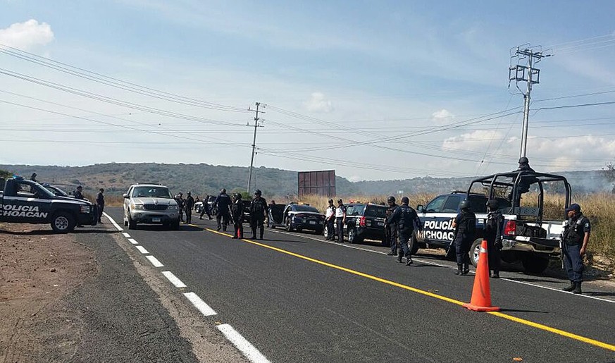 epa05688205 A handout photo made available by the Michoacan Public Security Secretariat (SSP) of a state police checkpoint in Michoacan, where six human heads were found in the Mexican municipality of ...