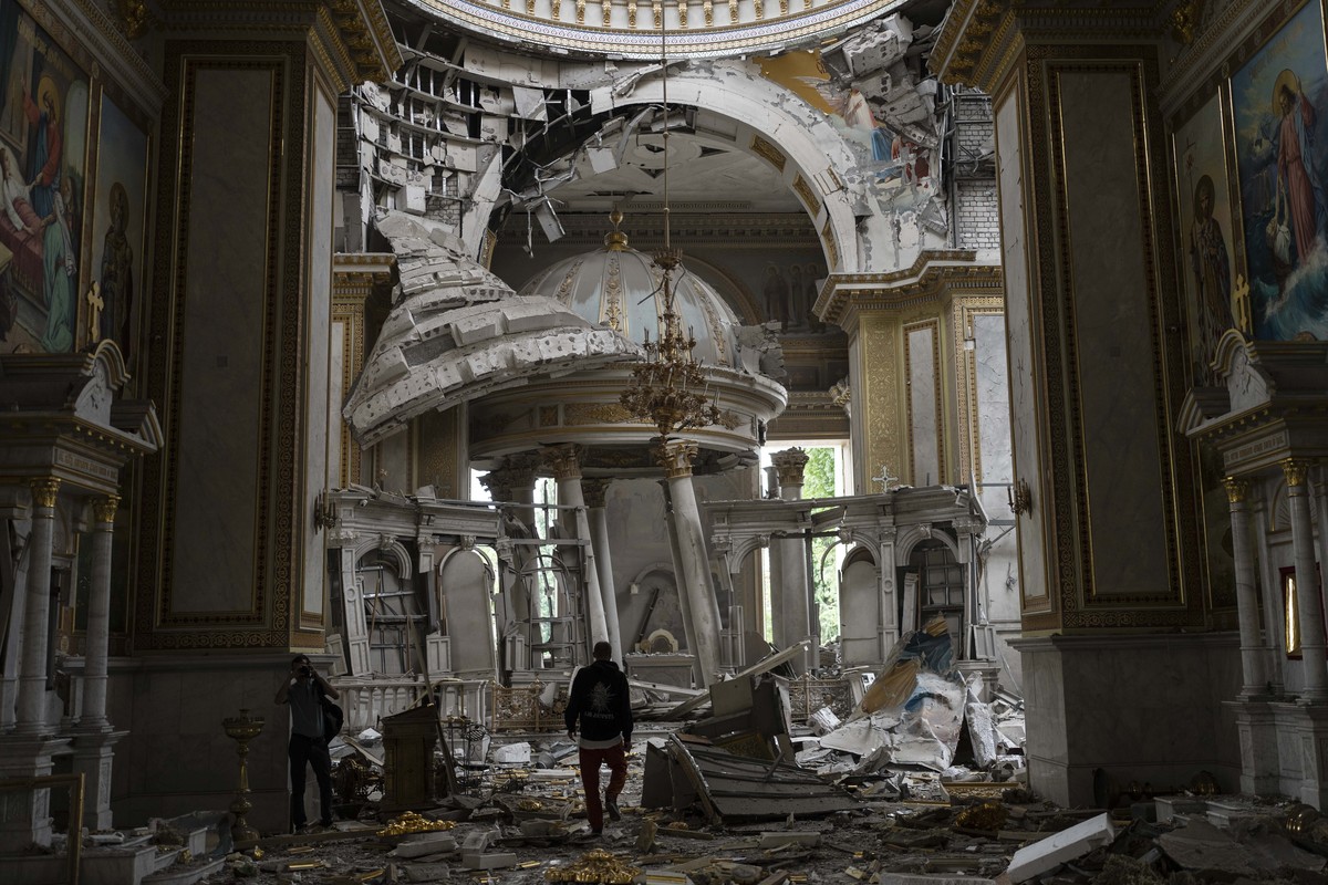 FILE - Church personnel inspect damages inside the Odesa Transfiguration Cathedral in Odesa, Ukraine, Sunday, July 23, 2023, following Russian missile attacks. Battles in recent weeks have taken place ...