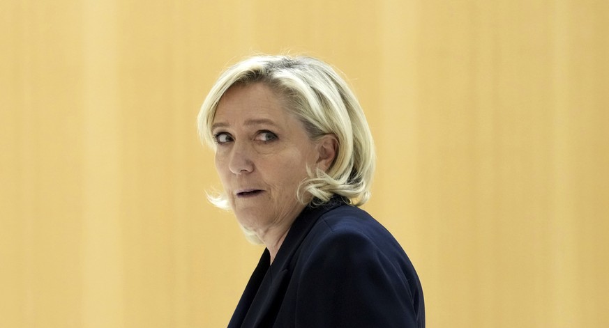 French far-right leader Marine Le Pen arrives at the courtroom for the trial over the suspected embezzlement of European Parliament funds, Wednesday, Nov. 6, 2024 in Paris. (AP Photo/Aurelien Morissar ...
