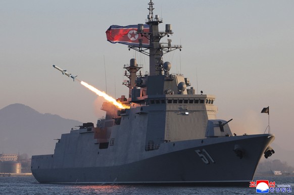 epaselect epa12888079 A photo released by the official North Korean Central News Agency (KCNA) shows a test-fire of strategic cruise missiles and anti-warship missiles from the destroyer Choe Hyon in  ...