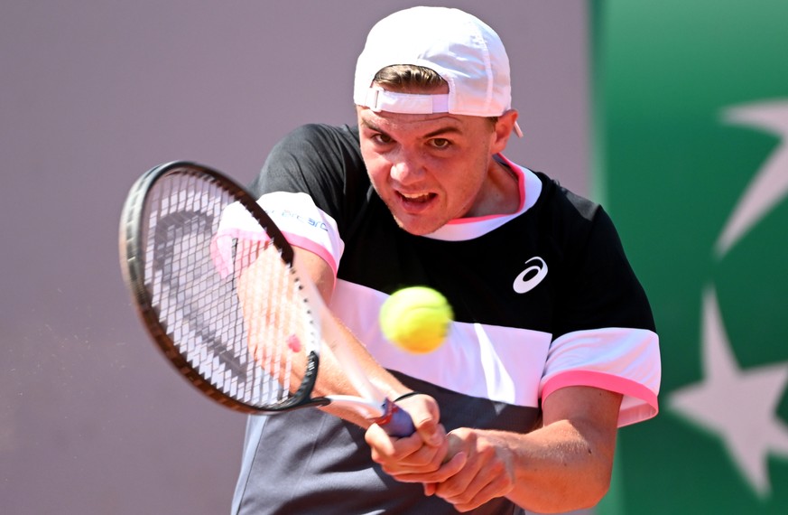 epa10662939 Dominic Stricker of Switzerland plays Tommy Paul of the USA in their Men&#039;s Singles first round match during the French Open Grand Slam tennis tournament at Roland Garros in Paris, Fra ...
