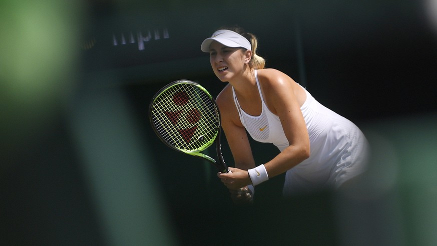 epa06871270 Belinda Bencic of Switzerland during her third round match against Carla Suarez Navarro of Spain at the Wimbledon Championships at the All England Lawn Tennis Club, in London, Britain, 07  ...