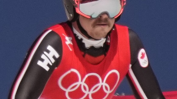 James Crawford of Canada competes in the men&#039;s super-G at the 2022 Winter Olympics, Tuesday, Feb. 8, 2022, in the Yanqing district of Beijing. (AP Photo/Robert F. Bukaty)