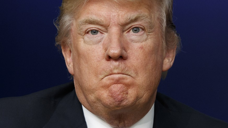 President Donald Trump listens to a question during a town hall with business leaders in the South Court Auditorium on the White House complex in Washington, Tuesday, April 4, 2017. (AP Photo/Evan Vuc ...