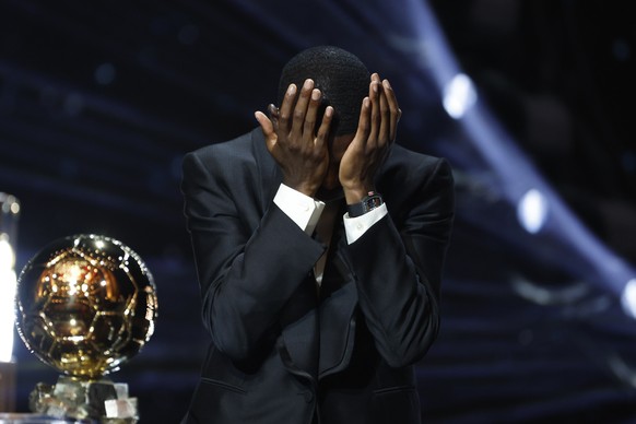 epa12398763 Paris Saint-Germain&#039;s player Ousmane Dembele accepts the Men&#039;s Ballon d&#039;Or trophy during the Ballon d&#039;Or 2025 ceremony at the Theatre du Chatelet in Paris, France, 22 S ...