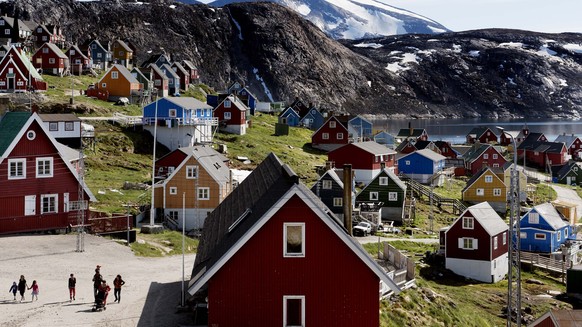 FILE - This July 11, 2015 file photo shows a general view of the town of Upernavik in western Greenland. Aiming to put his mark on the world map, President Donald Trump has talked to aides and allies ...