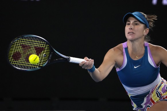 Belinda Bencic of Switzerland plays a forehand return to Claire Liu of the U.S. during their second round match at the Australian Open tennis championship in Melbourne, Australia, Thursday, Jan. 19, 2 ...