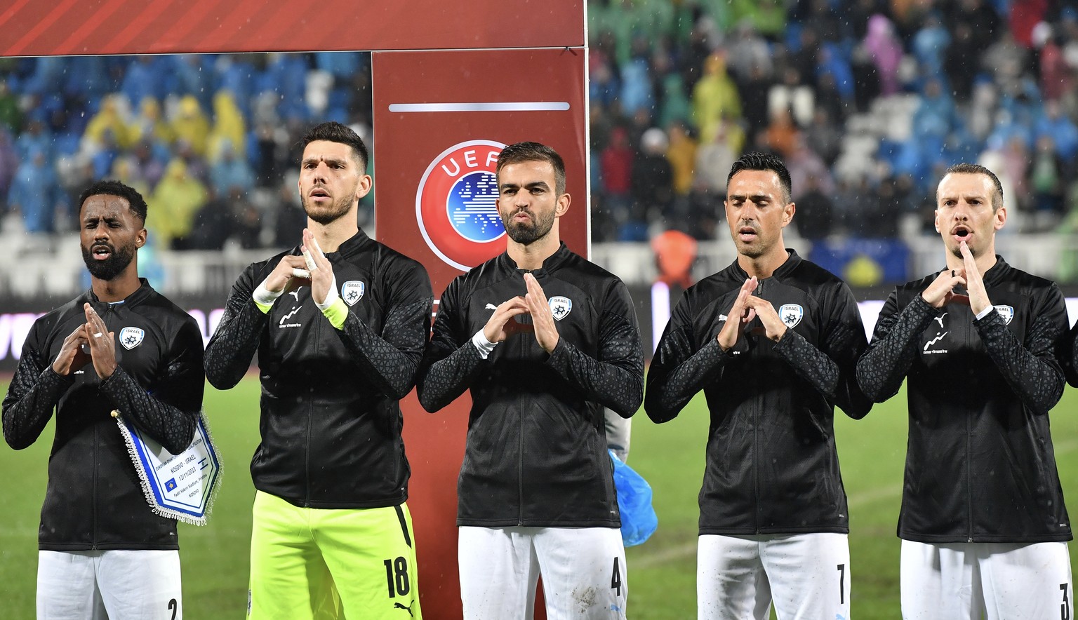 epa10972359 Israel&#039;s players sing the national anthem prior to the UEFA EURO 2024 qualification group I match between Kosovo and Israel in Pristina, Kosovo, 12 November 2023. EPA/GEORGI LICOVSKI