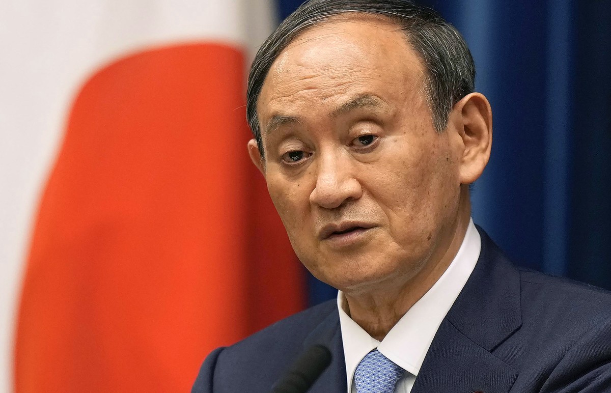 FILE - In this Aug. 17, 2021, file photo, Japanese Prime Minister Yoshihide Suga speaks during a news conference at prime minister's official residence in Tokyo. Broadcaster NHK says Friday, Sept ...