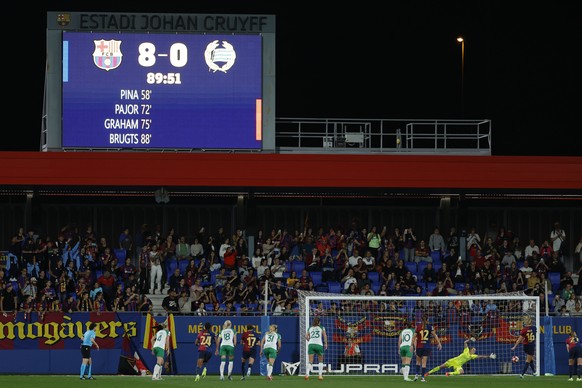 Barcelona&#039;s Fridolina Rolfo, 2nd right scores her side&#039;s 9th goal from a penalty kick during the women&#039;s Champions League group D soccer match between Barcelona and Hammarby at the Esta ...