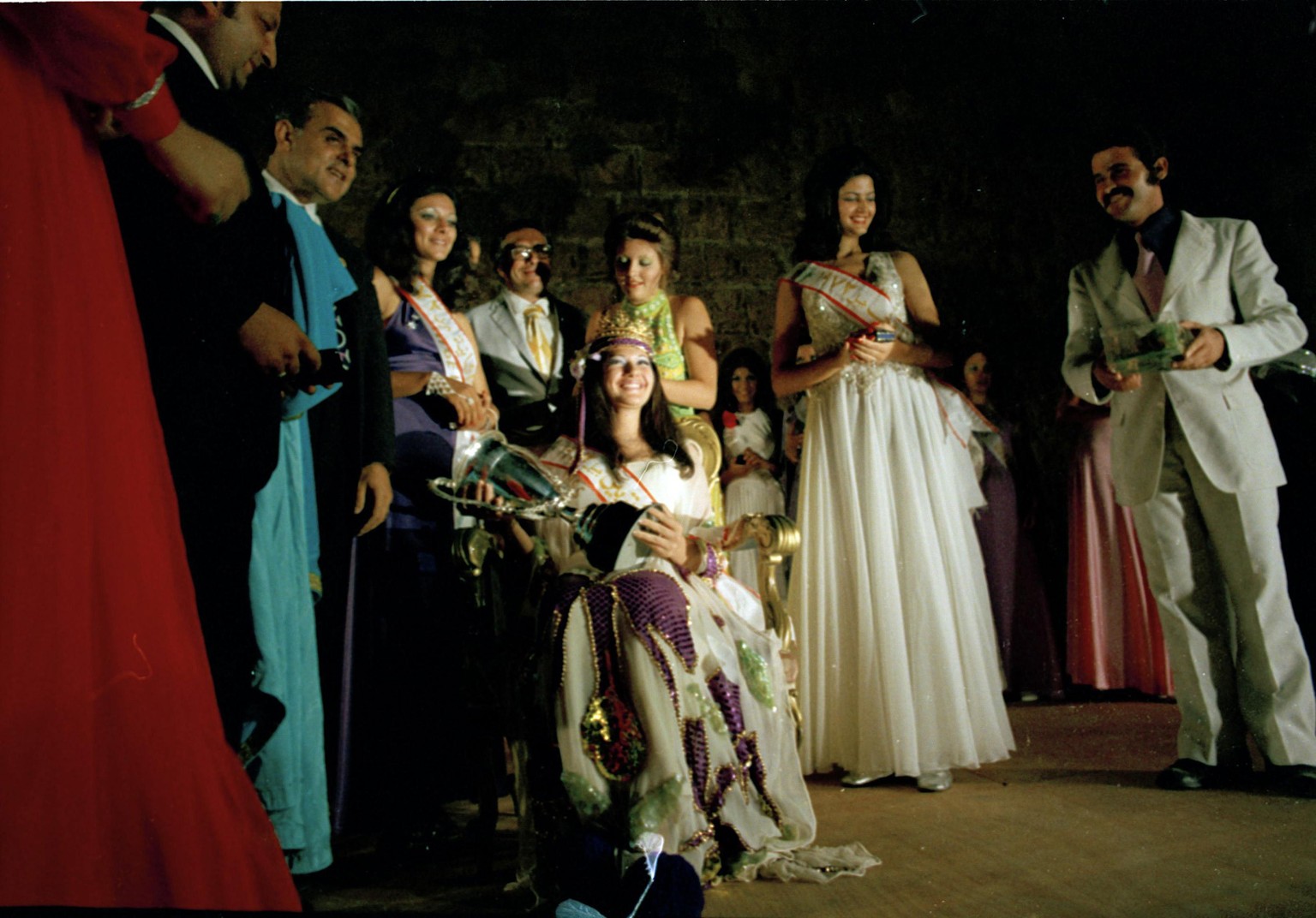 Contestants in a beauty pageant are seen in Beirut, Lebanon, Aug. 12, 1972. Beauty queen seated at center is Miss Venezuela, Marietta Marraoui, 19. (AP Photo/Harry Koundakjian)