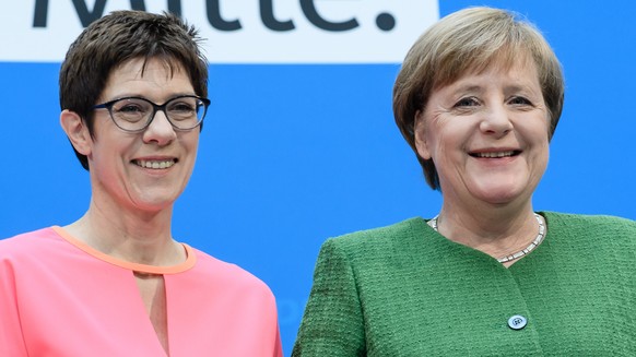 epa06542846 German Chancellor Angela Merkel (R), and the designated Secretary General, state premier of Saarland, Annegret Kramp-Karrenbauer, pose after a joint press conference following a party&#039 ...