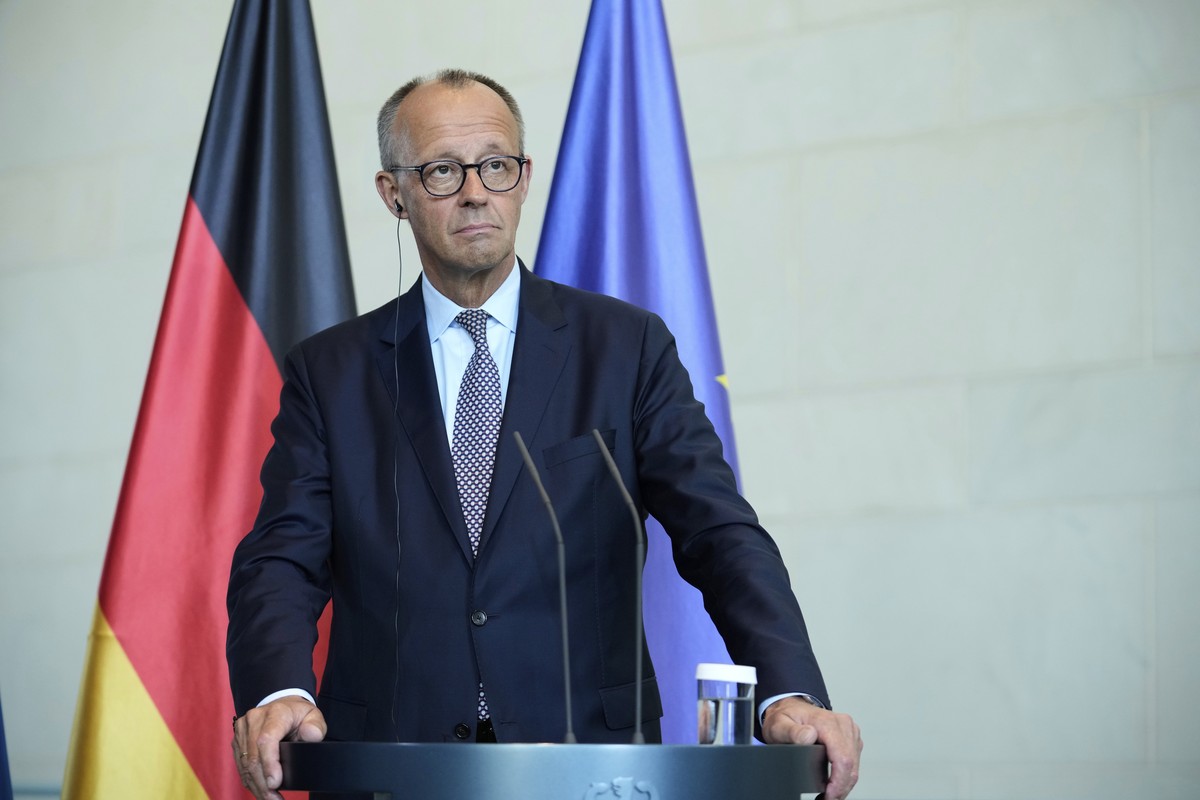 German Chancellor Friedrich Merz attends a joint press statement with Ukrainian President Volodymyr Zelenskyy following talks with European and U.S. leaders in Berlin, Germany, Wednesday, Aug. 13, 202 ...