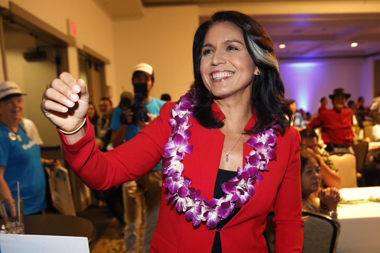 FILE - In this Nov. 6, 2018, file photo, Rep. Tulsi Gabbard, D-Hawaii, greets supporters in Honolulu. The 2020 presidential election already includes more than a half-dozen Democrats whose identities  ...