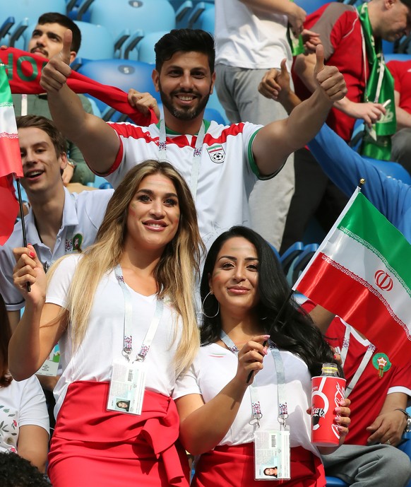 epa06810298 Supporters of Iran prior the FIFA World Cup 2018 group B preliminary round soccer match between Morocco and Iran in St.Petersburg, Russia, 15 June 2018.

(RESTRICTIONS APPLY: Editorial U ...