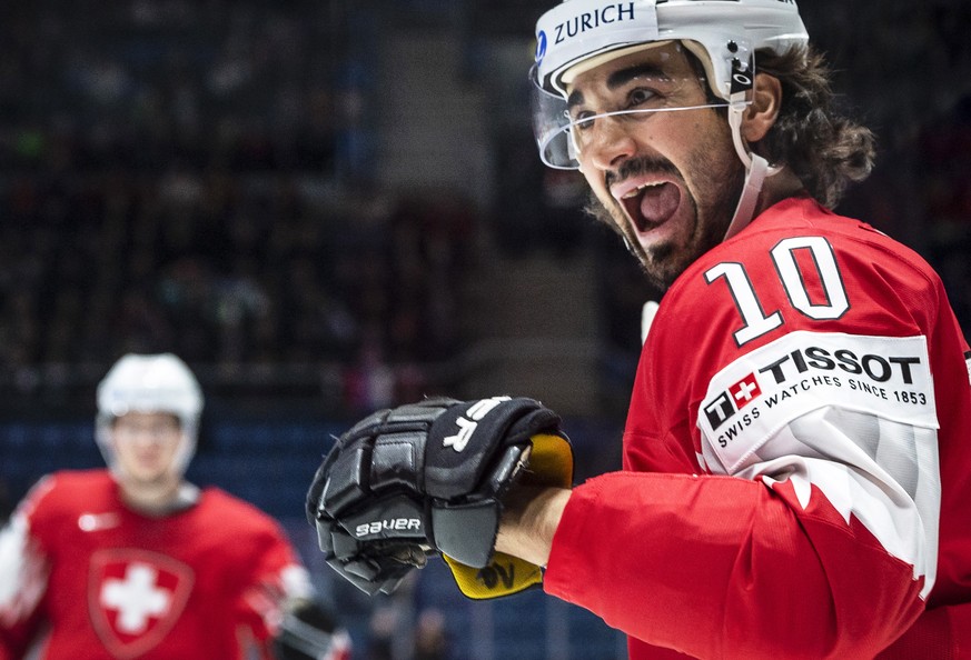 epa07573004 Switzerland&#039;s Andres Ambuehl celebrates after scoring the 1-0 lead during the IIHF World Championship group B ice hockey match between Switzerland and Norway at the Ondrej Nepela Aren ...