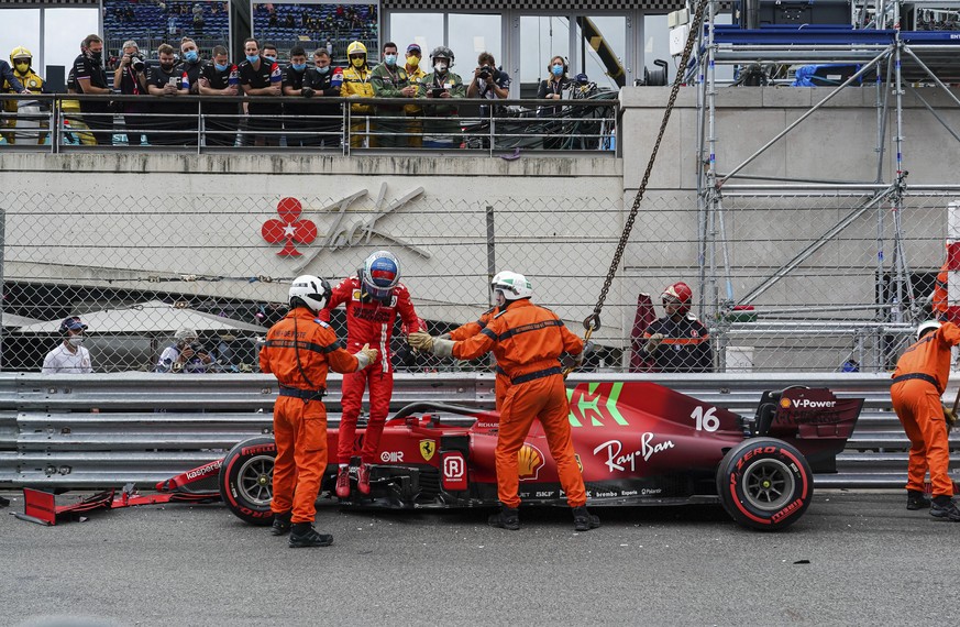 Ferrari driver Charles Leclerc of Monaco gets out of his car on the track after a crash during the qualifying session at the Monaco racetrack, in Monaco, Saturday, May 22, 2021. The Formula One race w ...