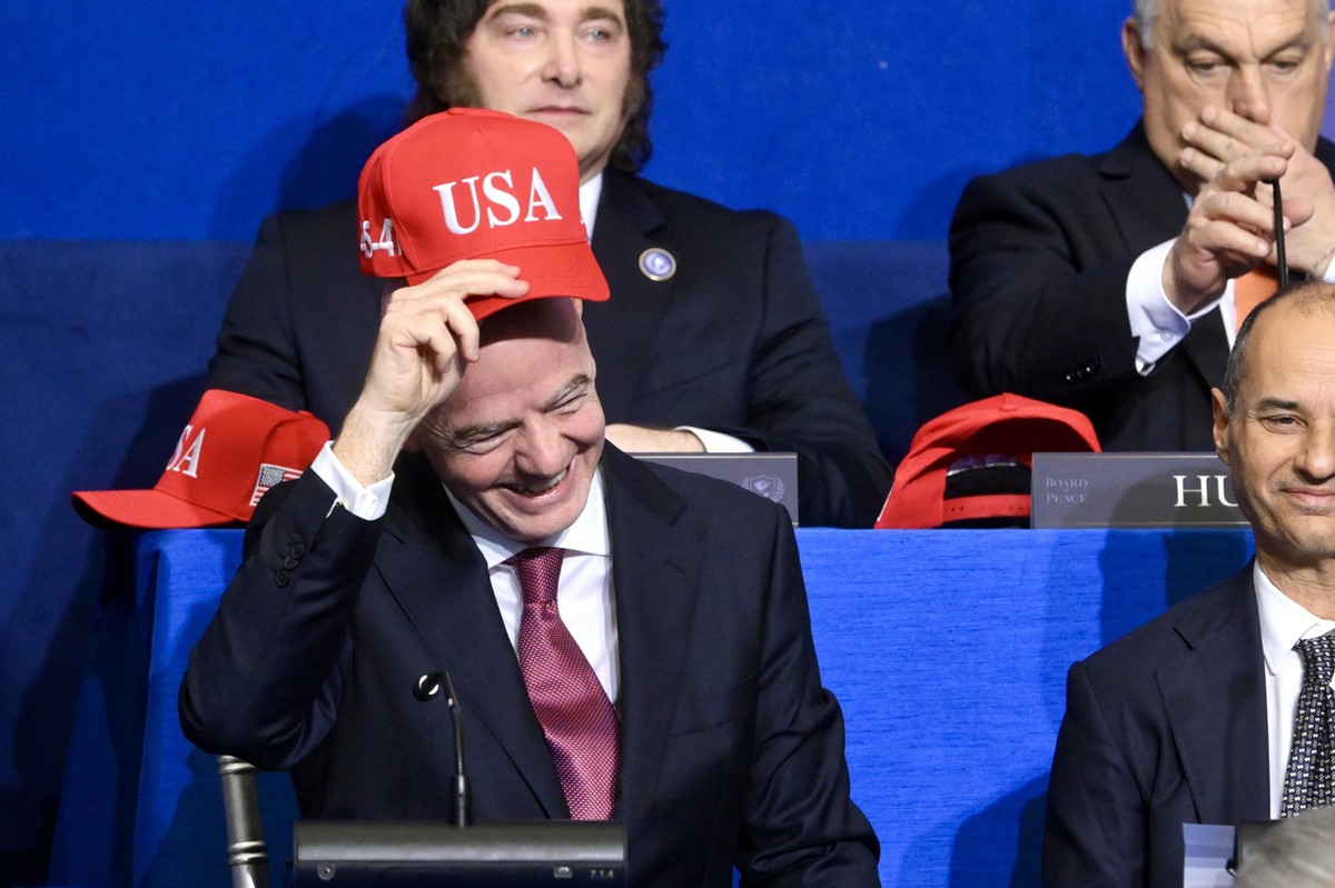 epa12758461 Gianni Infantino (L- front) president of FIFA attends the Board of Peace meeting at the Donald J. Trump U.S. Institute of Peace in Washington, USA, 19 February 2026. Established by Donald  ...