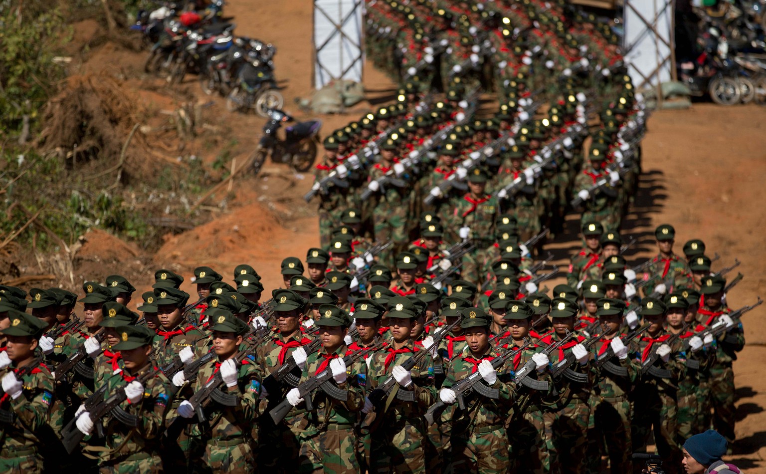 FILE - Ta'ang National Liberation army troops march in Mar Wong Village, northern Shan state during a celebration marking the 52nd anniversary of their insurrection against successive Myanmar gov ...