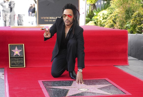 Lenny Kravitz poses at a ceremony honoring him with a star on the Hollywood Walk of Fame, Tuesday, March 12, 2024, in Los Angeles. (Photo by Jordan Strauss/Invision/AP)
Lenny Kravitz