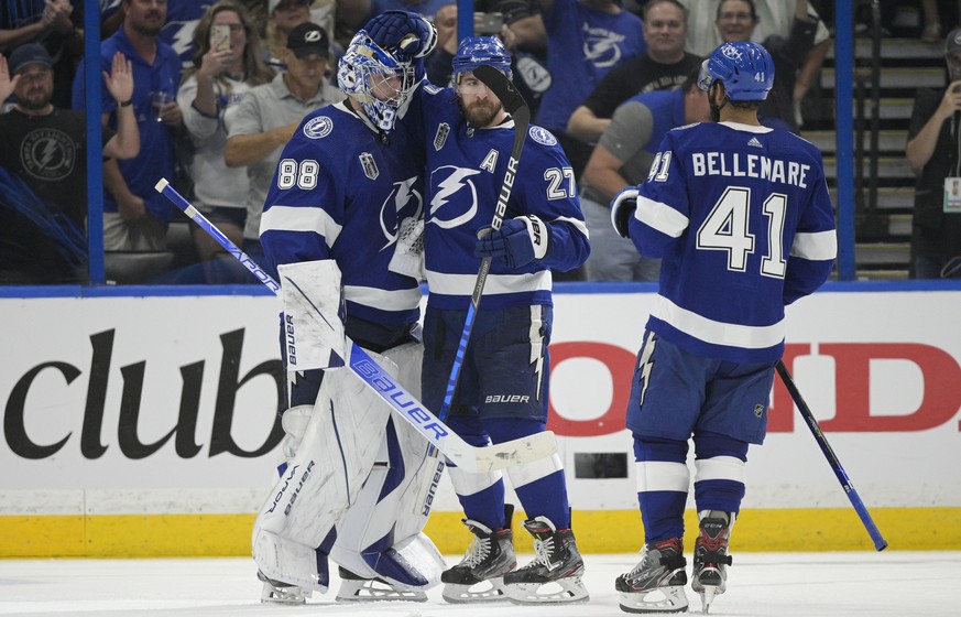 Tampa Bay Lightning goaltender Andrei Vasilevskiy (88) celebrates with Tampa Bay Lightning defenseman Ryan McDonagh (27) after Game 3 of the NHL hockey Stanley Cup Final against Colorado Avalanche on  ...