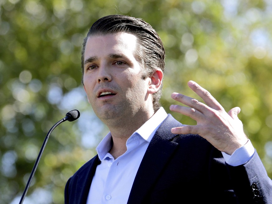 FILE - In this Friday, Nov. 4, 2016 file photo, Donald Trump Jr. campaigns for his father Republican presidential candidate Donald Trump in Gilbert, Ariz. Donald Trump’s eldest son, son-in-law and the ...