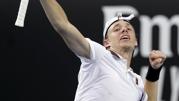 Canada&#039;s Denis Shapovalov celebrates after defeating Japan&#039;s Taro Daniel in their second round match at the Australian Open tennis championships in Melbourne, Australia, Thursday, Jan. 17, 2 ...