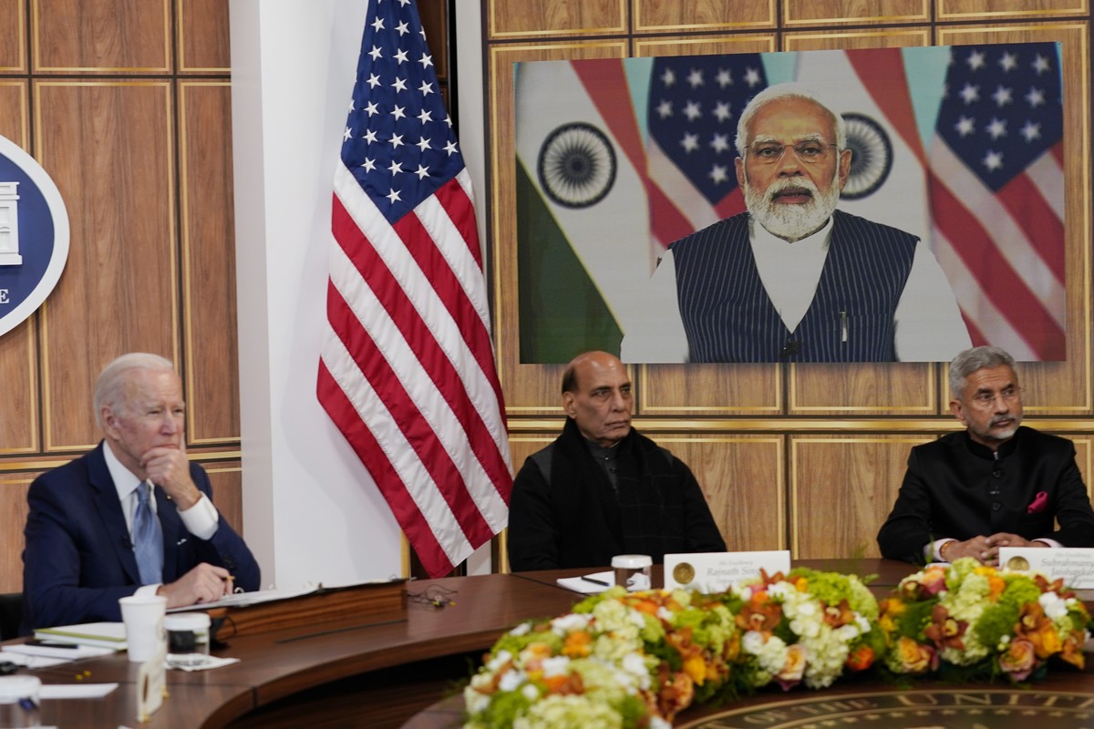 President Joe Biden meets virtually with Indian Prime Minister Narendra Modi in the South Court Auditorium on the White House campus in Washington, Monday, April 11, 2022. India's Defense ministe ...