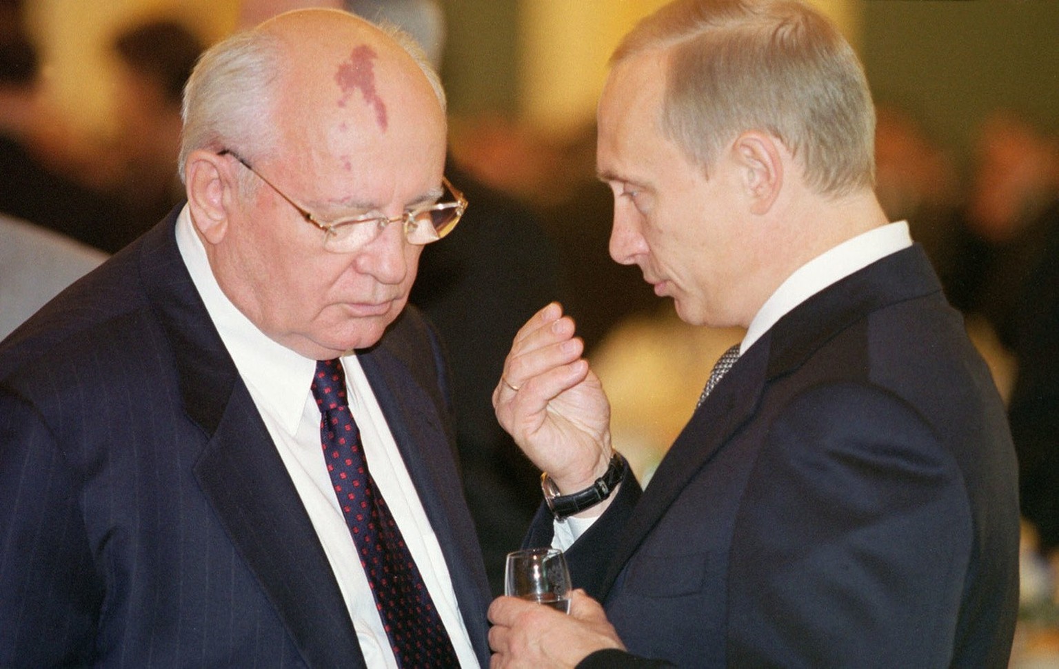 President of Russia Vladimir Putin (R) talks to Mikhail Gorbachev (L), the first and the last President of the Soviet Union during the state reception, held in the Grand Kremlin Palace in Moscow, Wedn ...