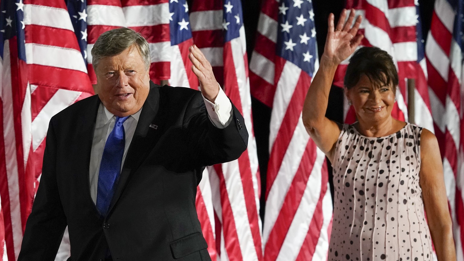 FILE - Viktor Knavs and Amalija Knavs, parents of first lady Melania Trump, wave after President Donald Trump spoke from the South Lawn of the White House, Aug. 27, 2020, in Washington. Amalija Knavs  ...
