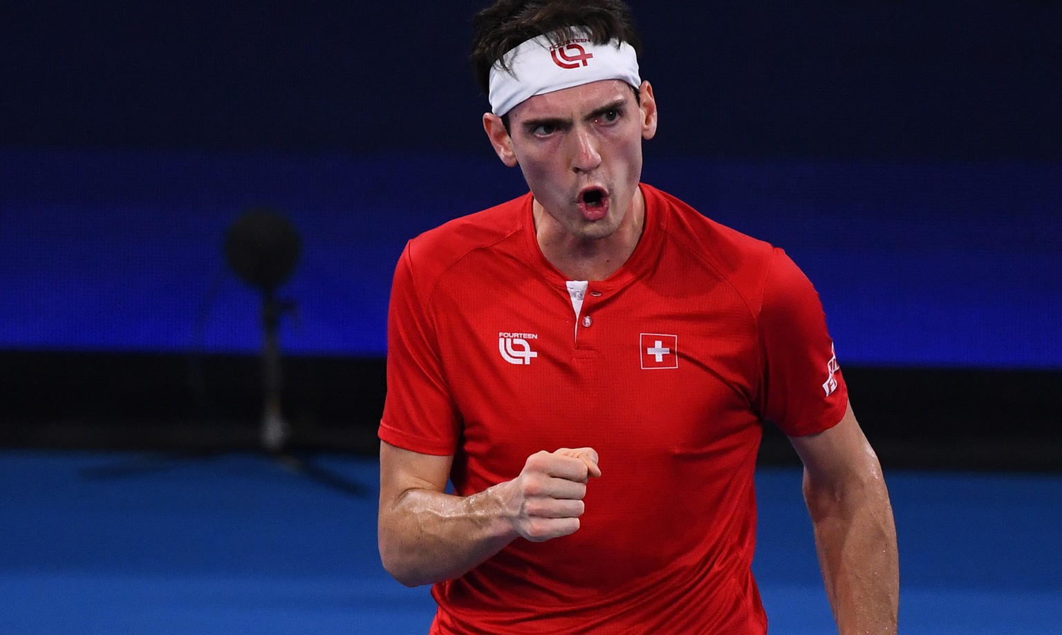 epa10381344 Marc-Andrea Huesler of Switzerland reacts during the 2023 United Cup tennis match between Switzerland and Kazakhstan at Pat Rafter Arena in Brisbane, Australia, 29 December 2022. EPA/JONO  ...