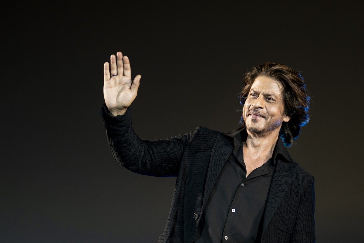 Indian actor Shah Rukh Khan reacts on the Piazza Grande area during the 77th Locarno International Film Festival, in Locarno, Switzerland, Saturday, August 10, 2024. (KEYSTONE/Jean-Christophe Bott)