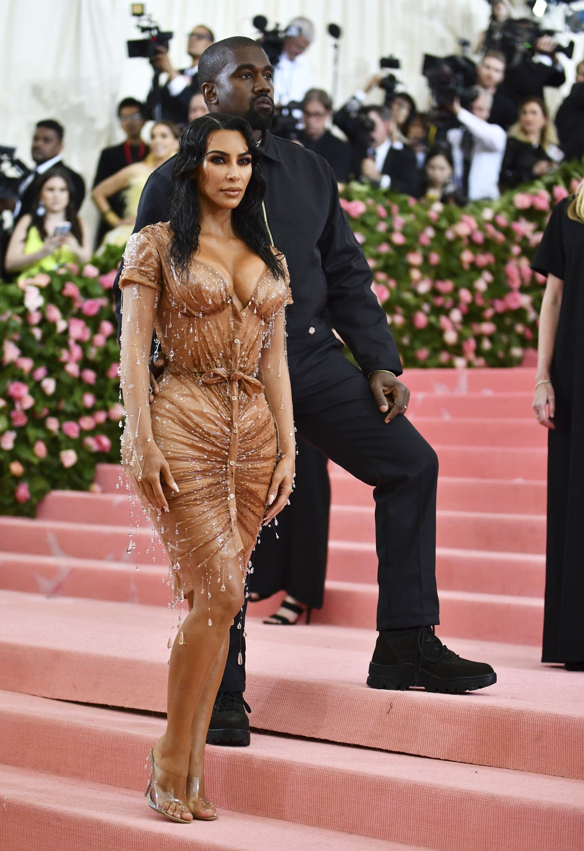 Kim Kardashian, left, and Kanye West attend The Metropolitan Museum of Art's Costume Institute benefit gala celebrating the opening of the "Camp: Notes on Fashion" exhibition on Monday, ...