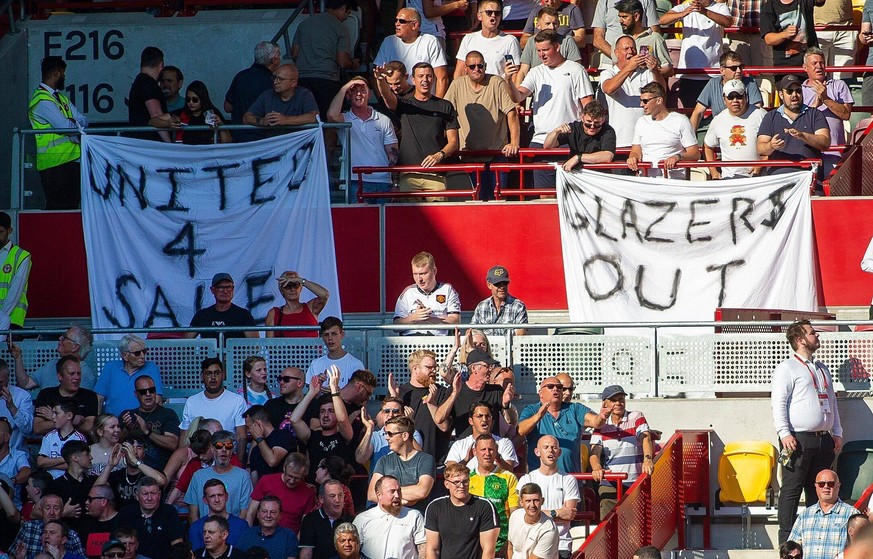 Mandatory Credit: Photo by Mark Greenwood/IPS/Shutterstock (13091210am) The Manchester United, ManU Fans display signs in a protest Brentford v Manchester United, Premier League, Football, Brentford C ...