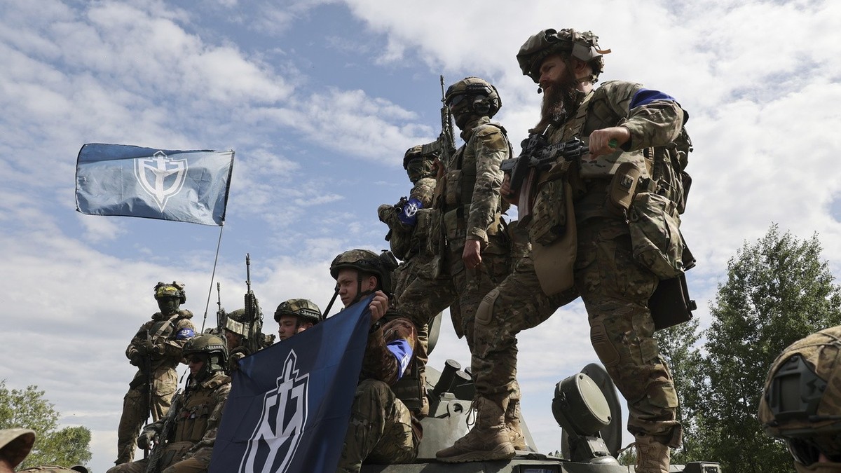 epa10650557 Members of the 'Russian Volunteer Corps' and 'Freedom of Russia Legion' hold a meeting with the media not far from the Ukraine-Russia border in Kharkiv's area, nor ...