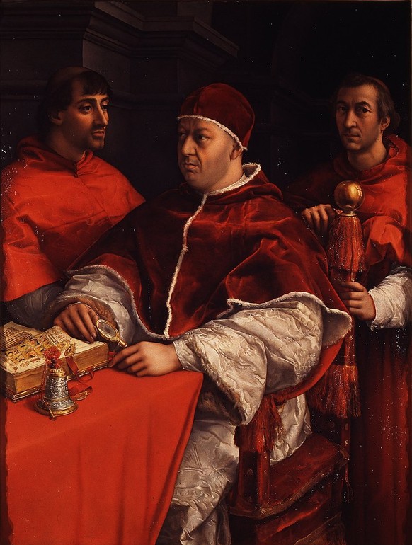 Leo X. (1475–1521) mit den Kardinälen Giulio de’ Medici, dem späteren Clemens VII. und Luigi de’ Rossi, auf einem Gemälde von Raffael, um 1518.